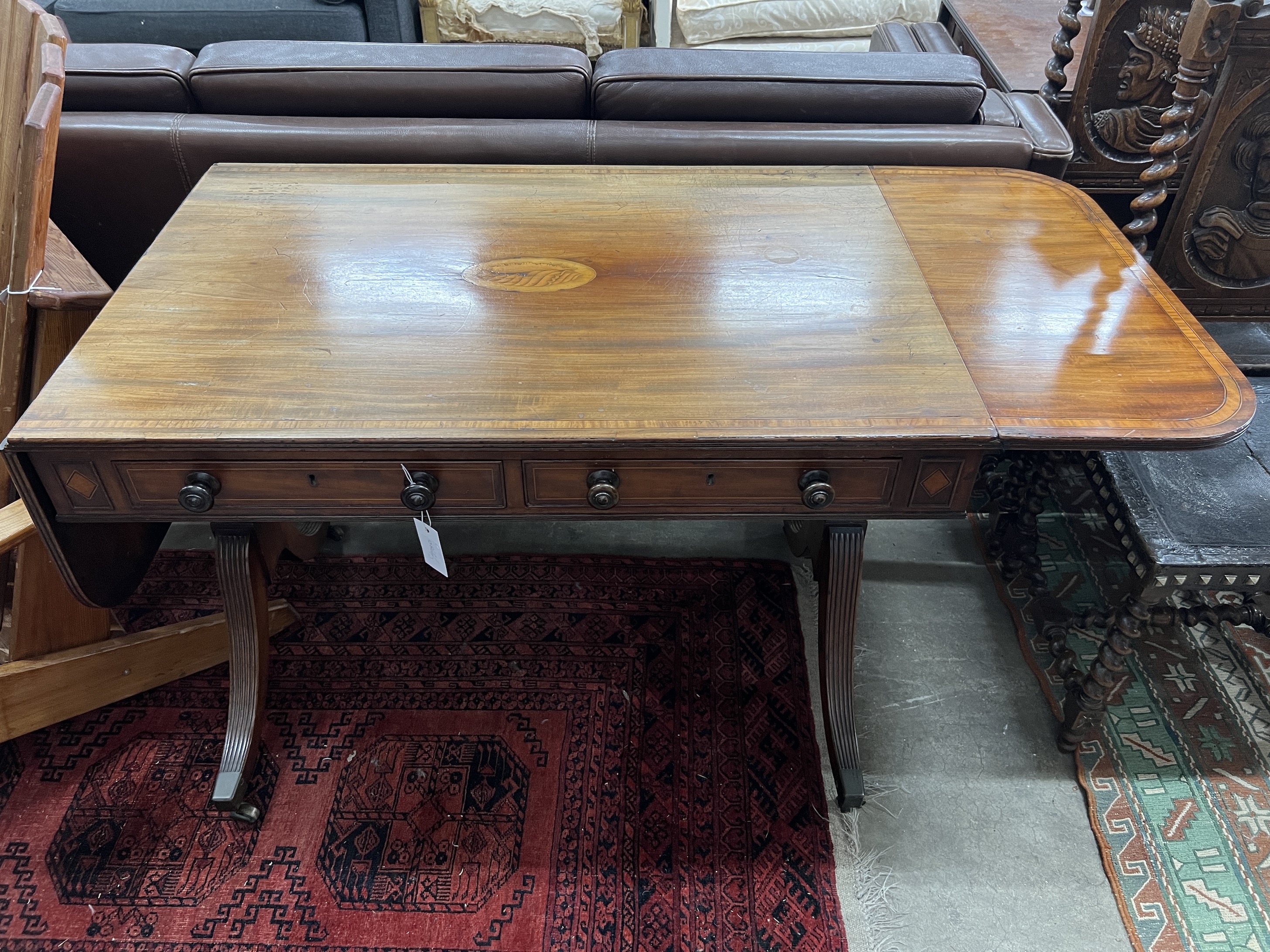 A George III satinwood banded and inlaid mahogany sofa table, width 97cm, depth 63cm, height 72cm